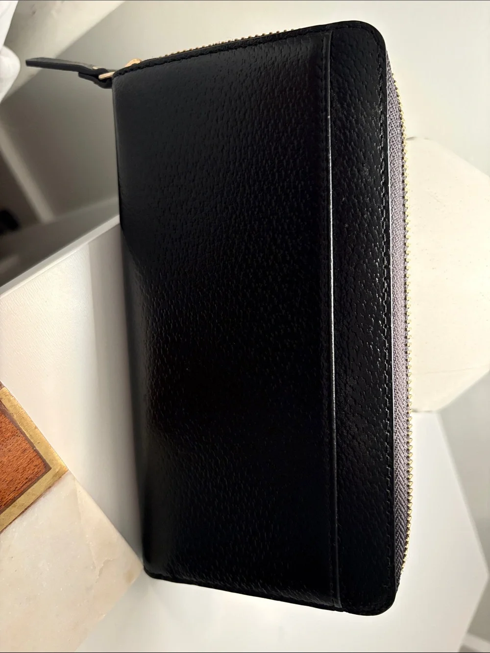 kate spade Black Pebbled Zip-Around Wallet with Gold Plaque